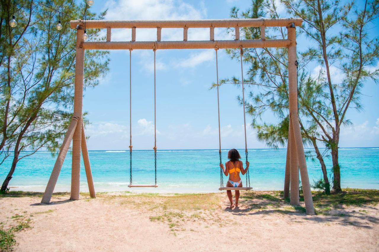 C Palmar - All Inclusive Belle Mare Exterior foto Swing at the beach