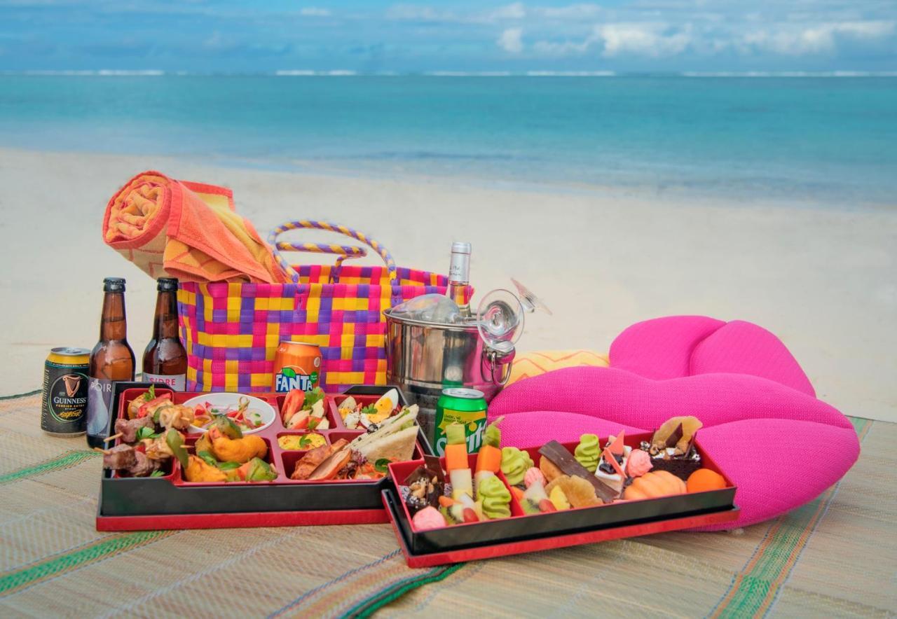 C Palmar - All Inclusive Belle Mare Exterior foto A beach picnic