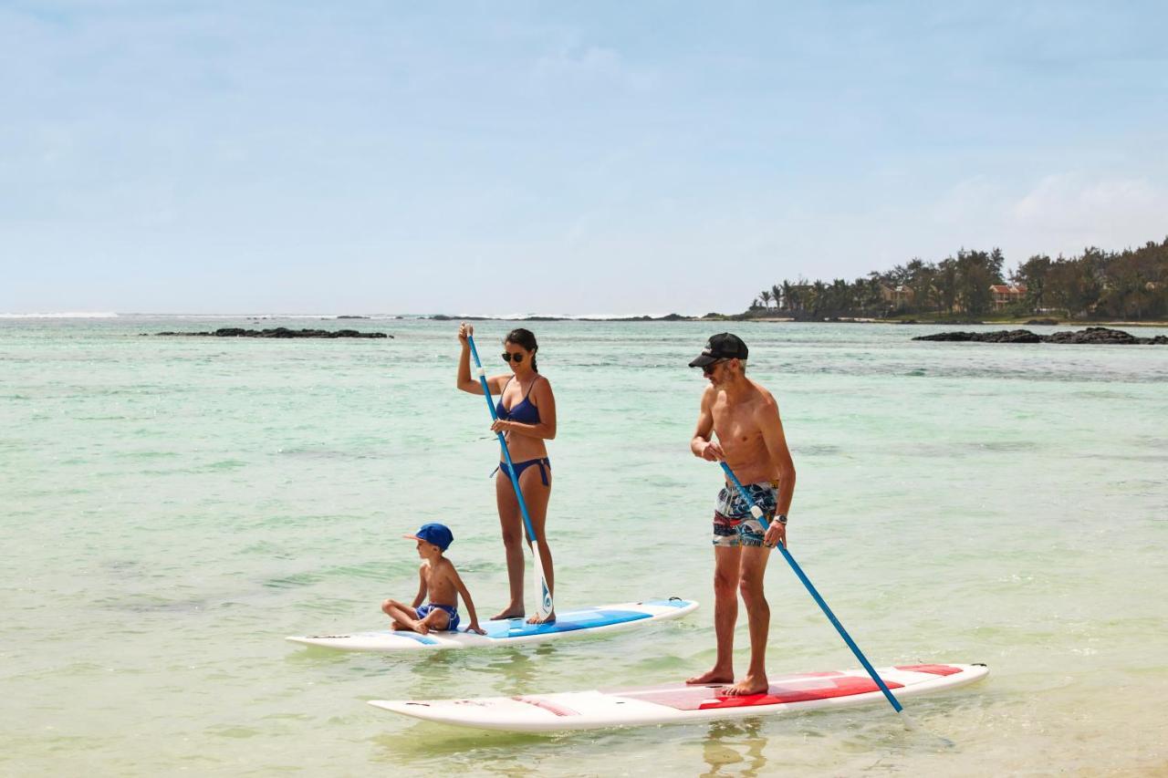 C Palmar - All Inclusive Belle Mare Exterior foto Stand up paddle boarders in Mauritius