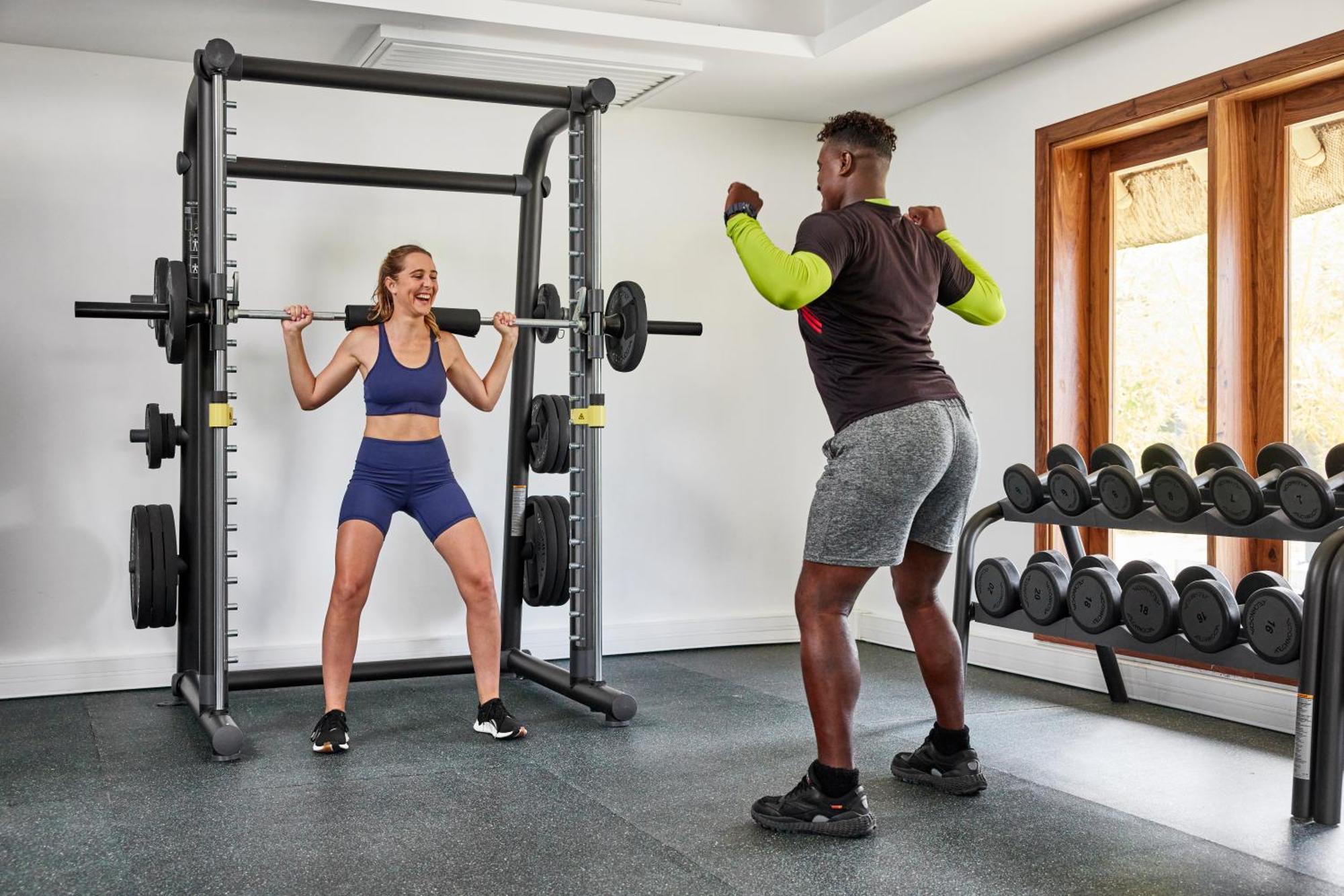 C Palmar - All Inclusive Belle Mare Exterior foto Personal trainer with a client